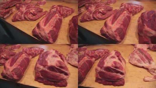 肉摊上案板上的猪肉五花肉高清在线视频素材下载