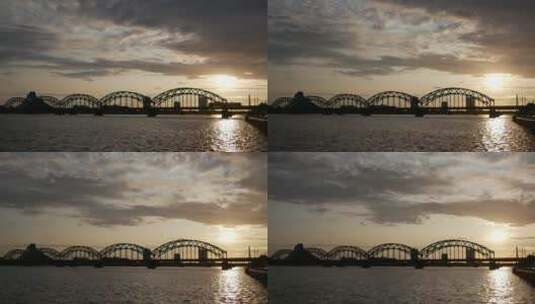 夕阳下铁路桥的剪影高清在线视频素材下载