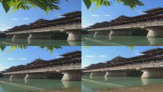 近景拍摄蓝天白云下的湖北省恩施州宣恩县侗族风雨桥高清在线视频素材下载