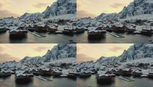 夕阳下白雪覆盖的渔镇村庄高清在线视频素材下载