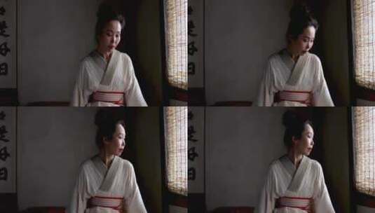 日本女人坐在茶室高清在线视频素材下载