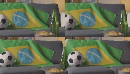 沙发上的巴西国旗和足球高清在线视频素材下载