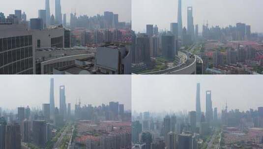 在朦胧云雾中的上海陆家嘴地标建筑航拍高清在线视频素材下载
