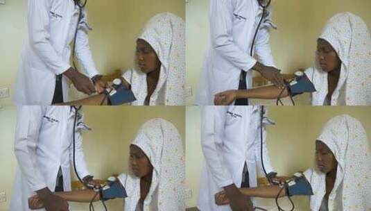 非洲医生用听诊器检查病人的血压和心跳。高清在线视频素材下载