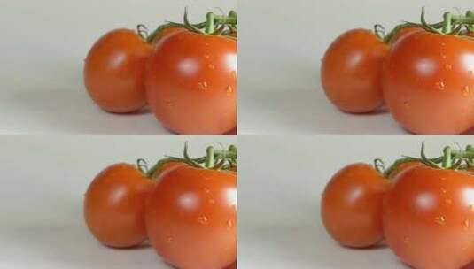 摇摄白色桌子上的西红柿高清在线视频素材下载