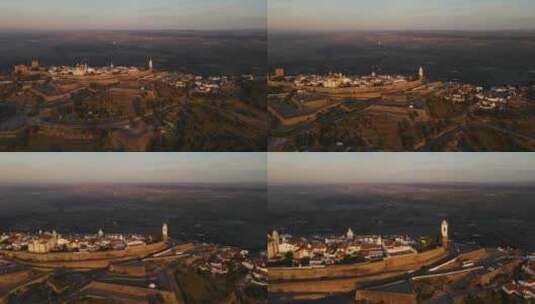 葡萄牙黄金时间黎明时分的蒙萨拉兹古村。空中前进的后代高清在线视频素材下载