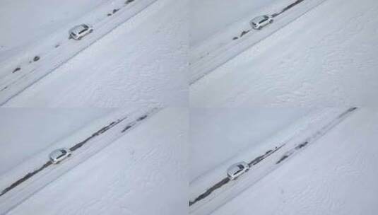 冬季森林里雪地公路上行驶的汽车高清在线视频素材下载