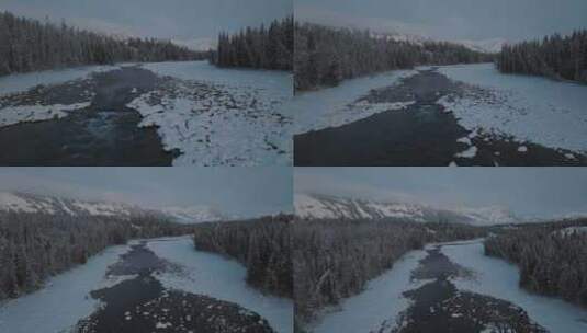 航拍黎明时分的新疆喀纳斯河雪景高清在线视频素材下载