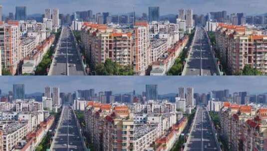 云南昆明城市建筑中的车流马路航拍高清在线视频素材下载