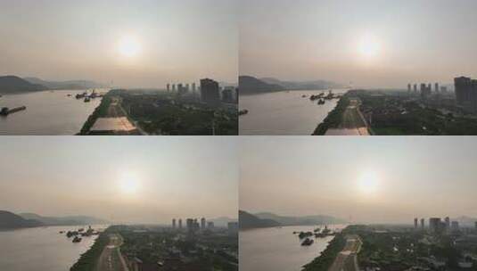 长江风光航拍武穴市滨江公园风景夕阳日落高清在线视频素材下载