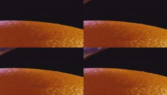 2K竖屏高速摄影橙子刨皮大特写高清在线视频素材下载