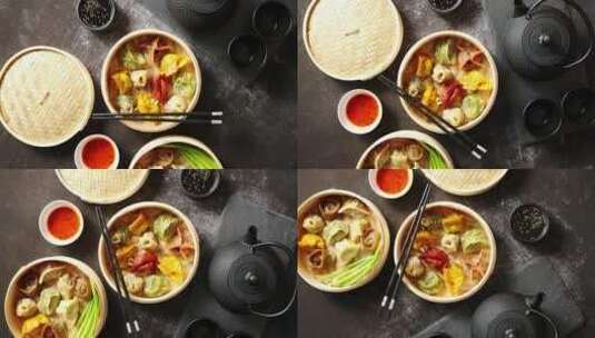 桌上放着蒸饺等特色中国美食高清在线视频素材下载