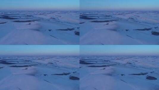 航拍内蒙冰雪覆盖的原野高清在线视频素材下载