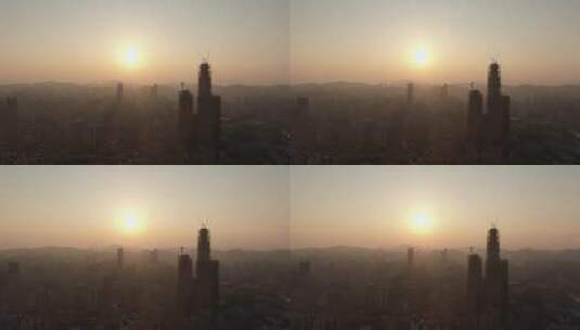 航拍城市高楼日出迷雾高清在线视频素材下载