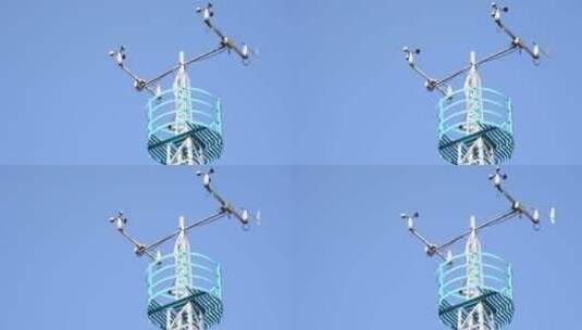 蓝天下气象站台的气象监测仪铁塔仰拍高清在线视频素材下载