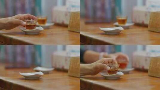 美味的绿茶倒在桌子上漂亮的玻璃碗里高清在线视频素材下载