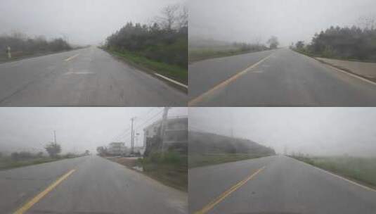 大雾天开车行驶在乡间道路第一视角高清在线视频素材下载