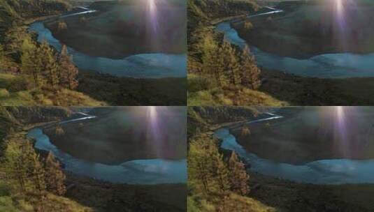 夕阳光晕下的峡谷森林河流高清在线视频素材下载