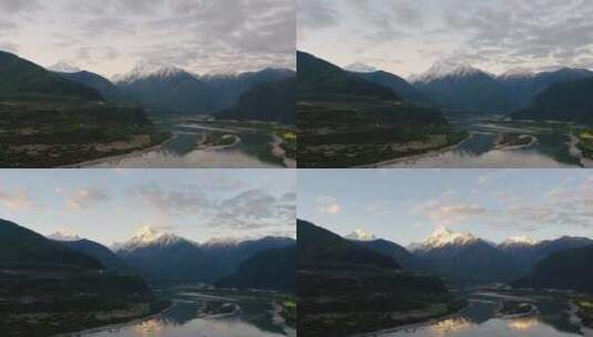 西藏雅鲁藏布大峡谷多雄拉雪山日出日照金山高清在线视频素材下载
