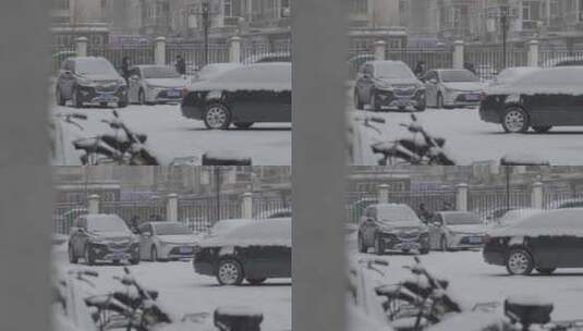黑龙江牡丹江市小区旁雪中清扫车子积雪夫妻高清在线视频素材下载