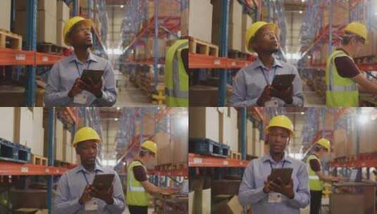 带头盔的非裔美国男性工人在仓库使用平板电脑高清在线视频素材下载