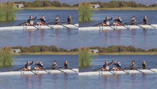 四个高加索男女在划艇上击掌高清在线视频素材下载