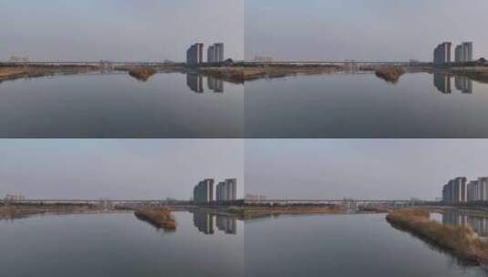 航拍四川广汉城市湔江湿地桥梁西成高铁空镜高清在线视频素材下载