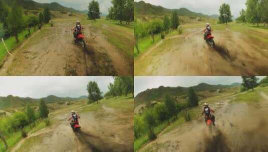 运动员骑摩托车穿过泥泞的水坑Fpv高清在线视频素材下载