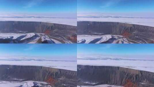 航拍新疆冬季安集海大峡谷红色山脉雪山河流高清在线视频素材下载