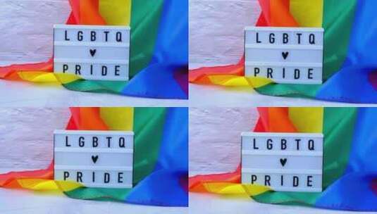 带灯箱和文本的彩虹旗帜LGBTQ PRI高清在线视频素材下载