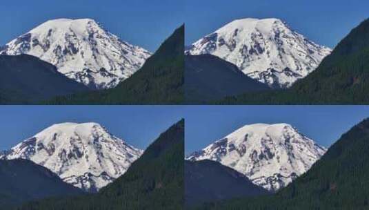 航拍高原绿色森林雪山唯美大自然风景高清在线视频素材下载