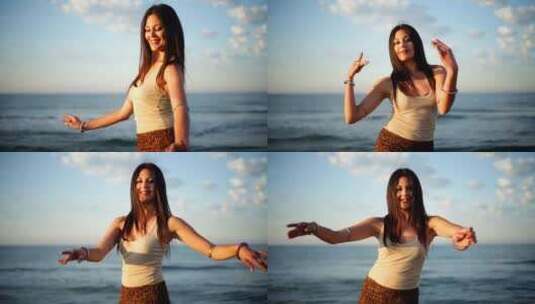 海滩边跳舞的女性高清在线视频素材下载