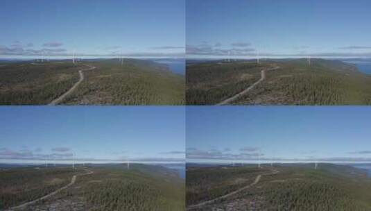 晴朗晴朗的一天下，挪威奥森风车旁的美丽风景——空中远景拍摄高清在线视频素材下载