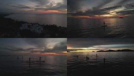 马来西亚日落国外小孩子划冲浪板4k航拍高清在线视频素材下载
