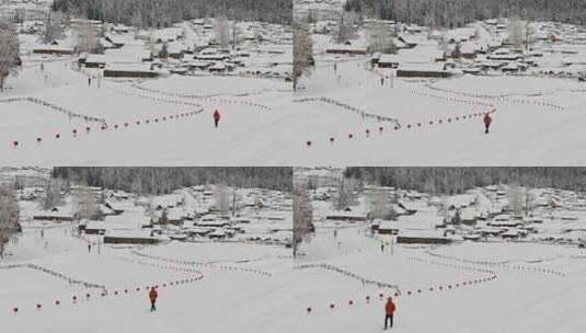 男人走在新疆白哈巴村的雪地上高清在线视频素材下载