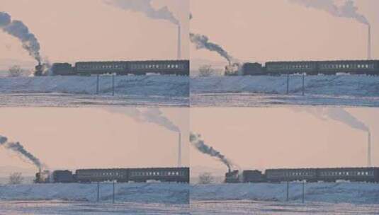 中国东北冬季白雪落日下的蒸汽机车老式火车高清在线视频素材下载