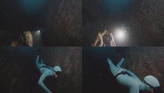 自由潜水员在海底游泳自由潜水员漂浮在水下高清在线视频素材下载
