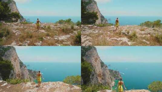 一个人凝视着壮观的海边悬崖景色。边缘的女高清在线视频素材下载