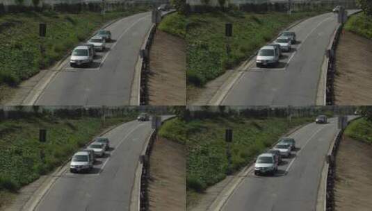 航拍车辆在道路上的红绿灯处停下来高清在线视频素材下载