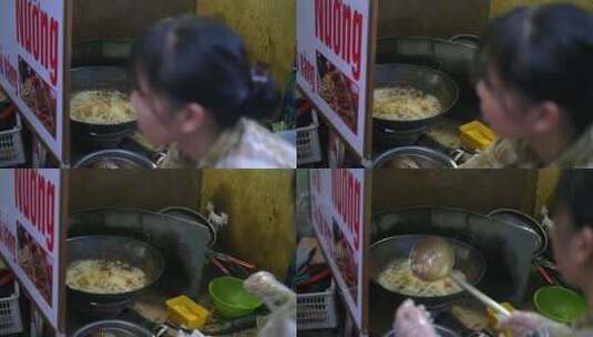 越南女士烹饪街头美食高清在线视频素材下载