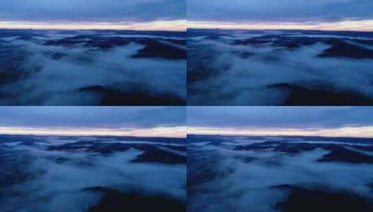 航拍夕阳映照下的山林晚雾高清在线视频素材下载