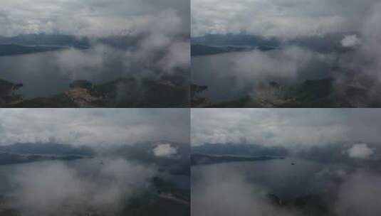 穿过云雾高空俯瞰泸沽湖高清在线视频素材下载