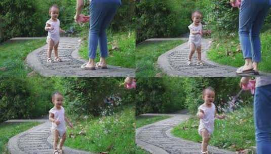 蹒跚学步小婴儿和妈妈户外玩耍泡泡快乐童年高清在线视频素材下载