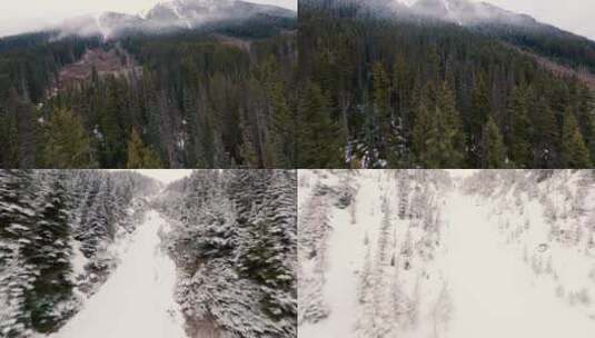 冬季穿越机飞越森林雪山山脉航拍高清在线视频素材下载