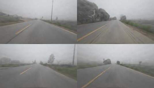 大雾天开车行驶在乡间道路第一视角高清在线视频素材下载