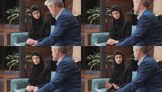 严肃的商业穆斯林阿拉伯女人说话倾听她的商业伙伴高清在线视频素材下载