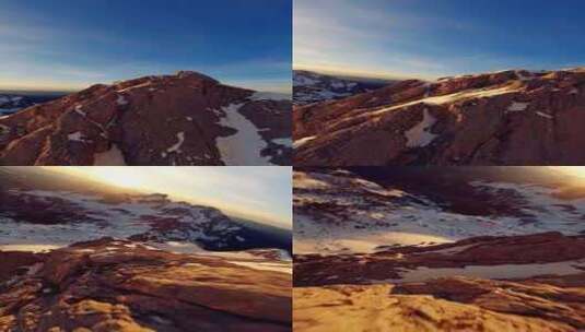FPV航拍雪山雪景高原山脉日出蓝天白云高清在线视频素材下载