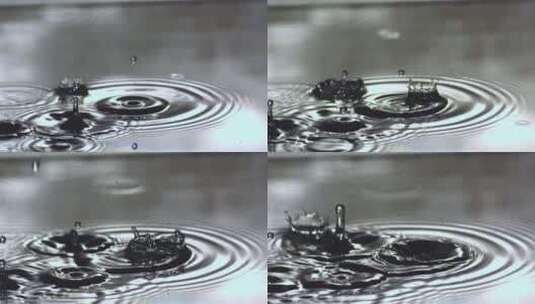 水滴落在水面上溅起涟漪慢镜头高清在线视频素材下载