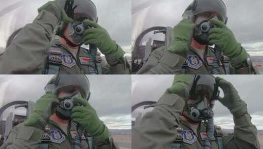 一位战斗机驾驶员在驾驶舱带上面罩高清在线视频素材下载