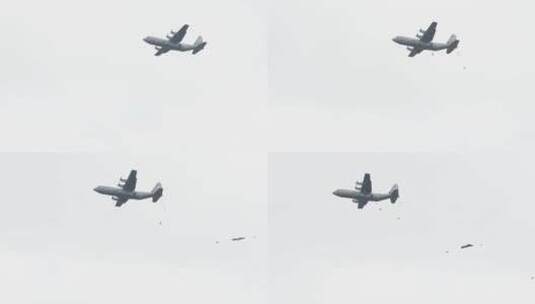 军事演习上伞兵陆续从飞机上跳伞高清在线视频素材下载